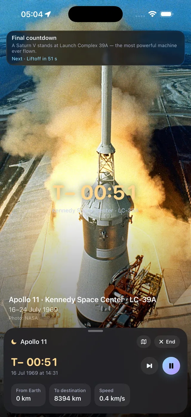 Apollo 11 replay in Ad Astra: the Saturn V on Launch Complex 39A at T minus 51 seconds, with the mission HUD showing distance and speed