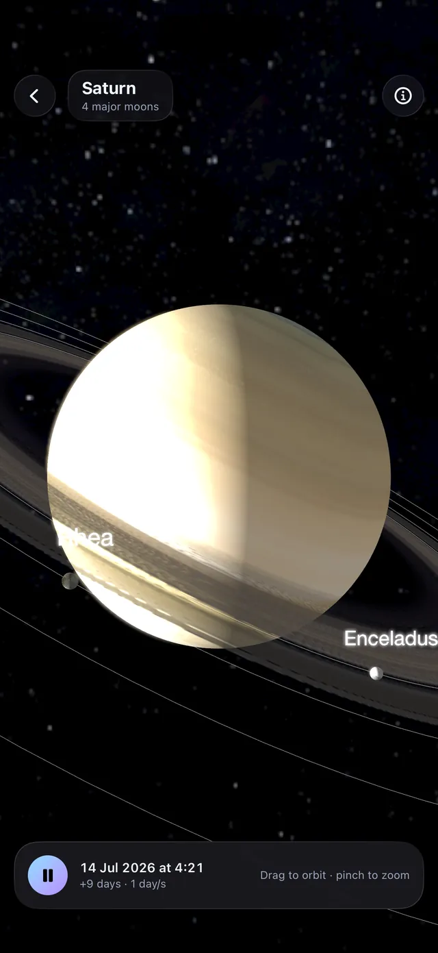 A 3D close-up of Saturn in Ad Astra, with its rings and the moons Rhea and Enceladus